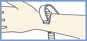 2. Place one end of the Bracelet Butler® on top of the bracelet near the clasp with your free hand.